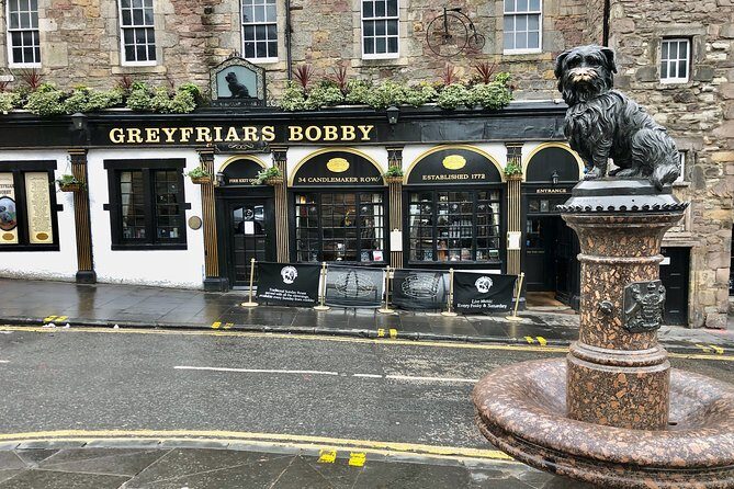 Essential Walking Tour of Edinburgh's Old Town - Mercat Cross: where the town met and talked