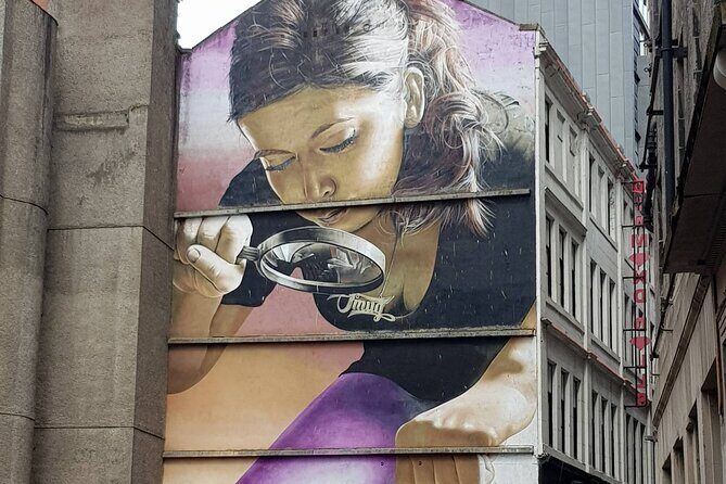 Glasgow Private Self-Guided Tour - St Enoch cradling St Mungo: a mural you’ll remember longer than the stop itself