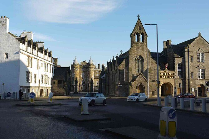 Highlights from the Royal Mile: A Self-Guided Audio Tour - Mercat Cross and Tron Kirk: the street where events got loud