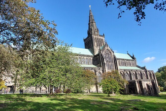 Privately Guided Day Tour of Glasgow in Luxury Minivan - George Square: city chambers, statues, and film-ready architecture