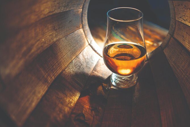 Speyside Whisky Day Tour from Inverness Including Admissions - Tomatin Distillery Visitor Centre: A 1897-Founded Start and the First Pour